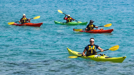 A group of kayakers in the sea