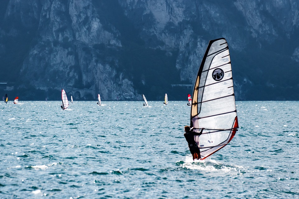 Group of windsurfers out at sea
