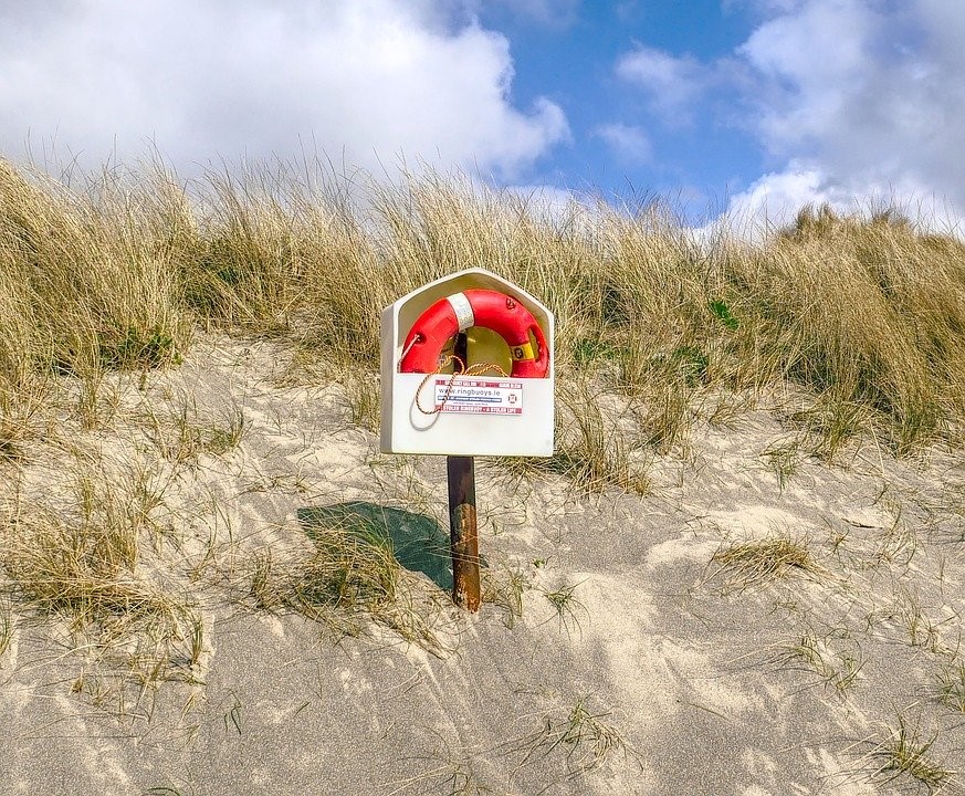 life preserver ring on a beach